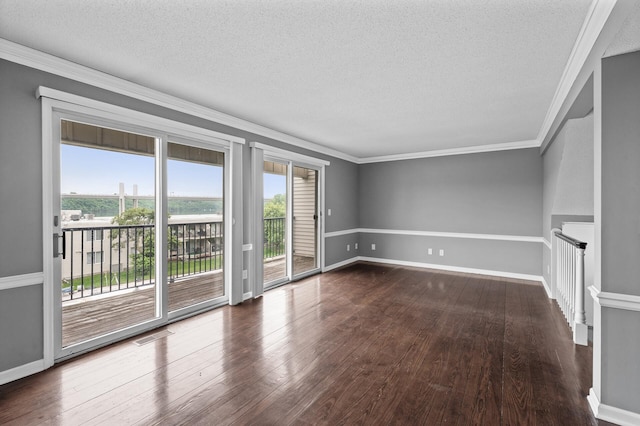 6331 Saint Croix Trl N, Stillwater, MN 55082 - empty room featuring a textured ceiling, hardwood / wood-style flooring, ornamental molding, and baseboards