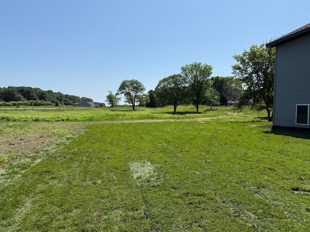 3309 171st Ave NE, Ham Lake, MN 55304 - view of green lawn with a rural view