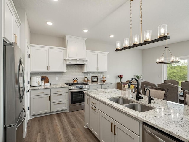3309 171st Ave NE, Ham Lake, MN 55304 - kitchen featuring stainless steel appliances, dark wood-style floors, decorative light fixtures, white cabinets, and recessed lighting