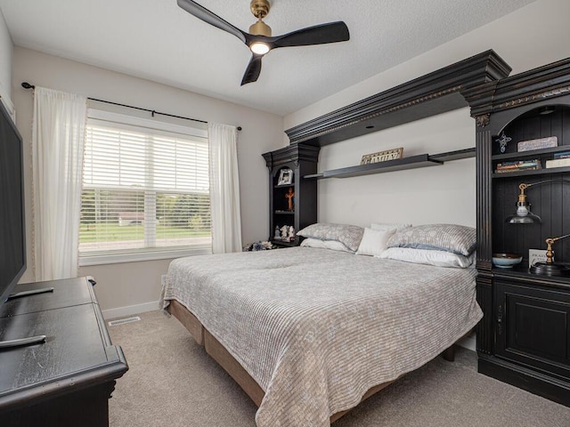 3309 171st Ave NE, Ham Lake, MN 55304 - carpeted bedroom with baseboards and a ceiling fan