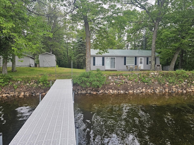 27042 Bluebill Point Rd, Garrison, MN 56450 - dock area featuring a lawn and a water view