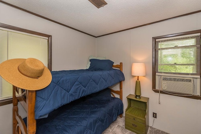27042 Bluebill Point Rd, Garrison, MN 56450 - bedroom featuring crown molding, a textured ceiling, carpet, and cooling unit