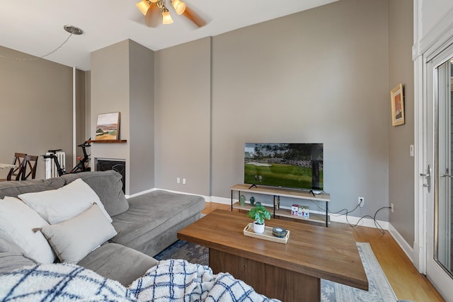 112 Western Ave N Unit 4, Saint Paul, MN 55102 - living area with ceiling fan, wood finished floors, and baseboards