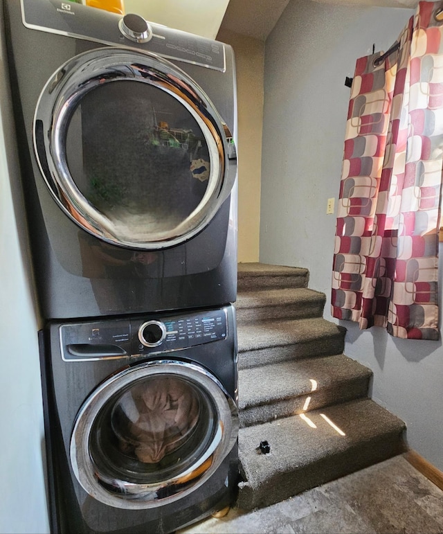 413 7th St W, Canby, MN 56220 - laundry room featuring estacked washer and dryer