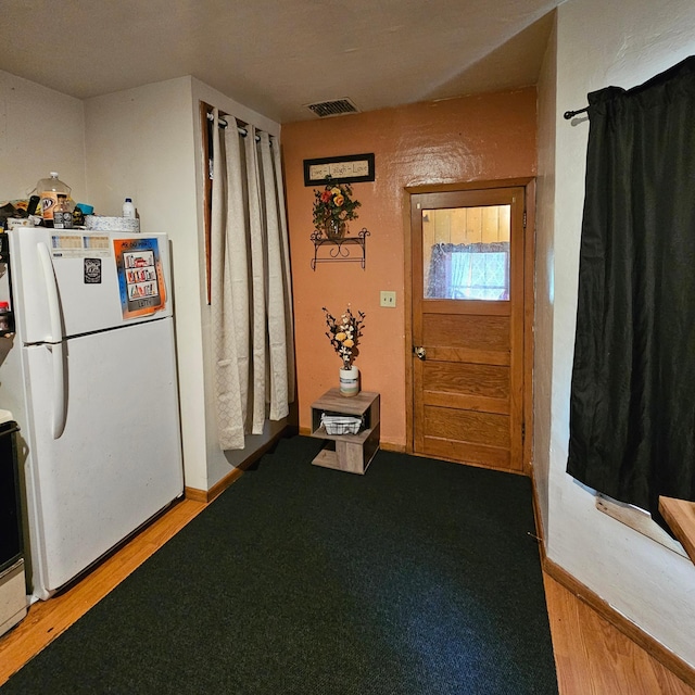 413 7th St W, Canby, MN 56220 - foyer with light wood-style flooring