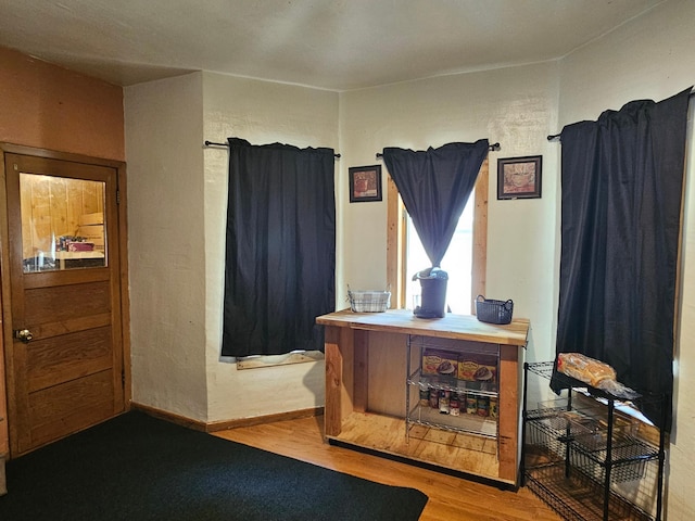 413 7th St W, Canby, MN 56220 - interior space featuring wood finished floors and baseboards