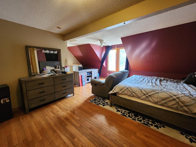 315 3rd St SW, Stewartville, MN 55976 - bedroom featuring a textured ceiling and hardwood / wood-style flooring