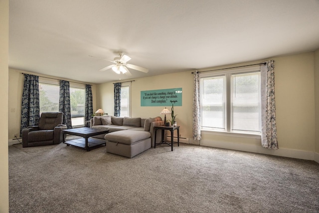 836 Milligan Ave, Wabasha, MN 55981 - carpeted living room featuring baseboard heating, healthy amount of natural light, and a ceiling fan