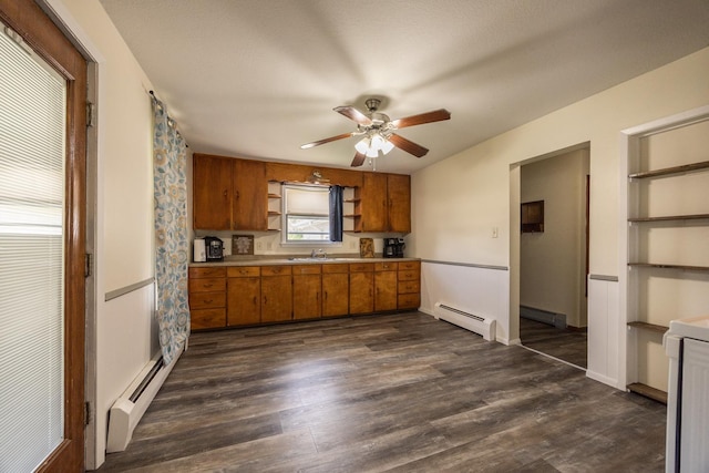836 Milligan Ave, Wabasha, MN 55981 - kitchen with open shelves, a baseboard heating unit, brown cabinets, and a baseboard radiator
