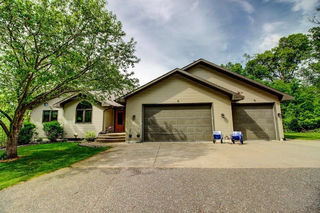 8824 Bittersweet Cir, Breezy Point, MN 56472 - ranch-style home with driveway, a garage, and a front lawn