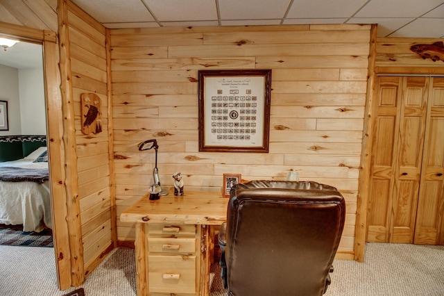 8824 Bittersweet Cir, Breezy Point, MN 56472 - office area featuring light colored carpet, wooden walls, and a drop ceiling