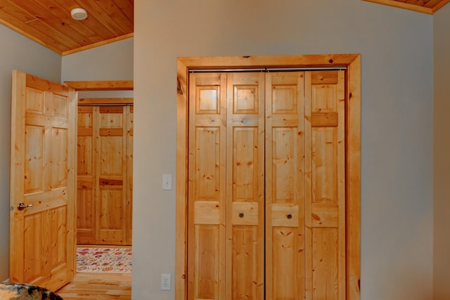 8824 Bittersweet Cir, Breezy Point, MN 56472 - hallway featuring crown molding, wood finished floors, wood ceiling, and vaulted ceiling