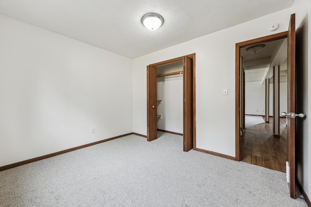 2140 Prospect Dr NE, Saint Cloud, MN 56304 - unfurnished bedroom with carpet flooring, baseboards, and a closet