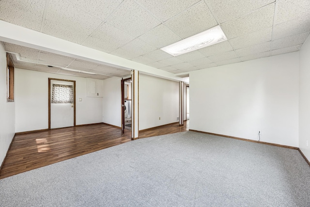 2140 Prospect Dr NE, Saint Cloud, MN 56304 - finished basement featuring carpet, a drop ceiling, baseboards, and wood finished floors