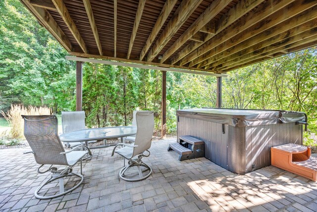 1893 White Oak Dr, Chaska, MN 55318 - view of patio / terrace featuring a hot tub and outdoor dining area
