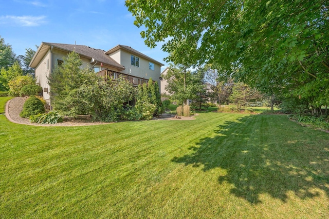 1893 White Oak Dr, Chaska, MN 55318 - view of green lawn with a deck
