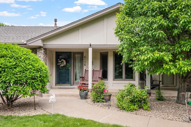 6136 Arctic Way, Edina, MN 55436 - property entrance featuring a porch and a shingled roof