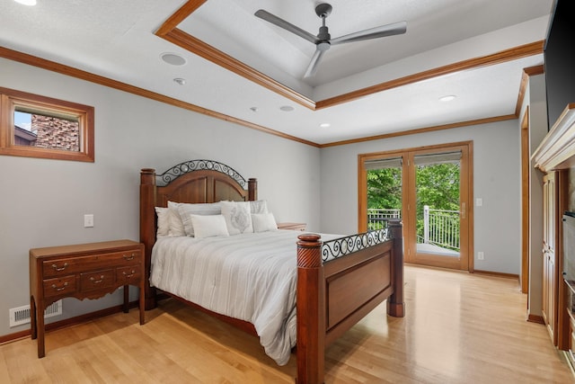 6136 Arctic Way, Edina, MN 55436 - bedroom featuring access to exterior, light wood-style floors, a tray ceiling, crown molding, and recessed lighting