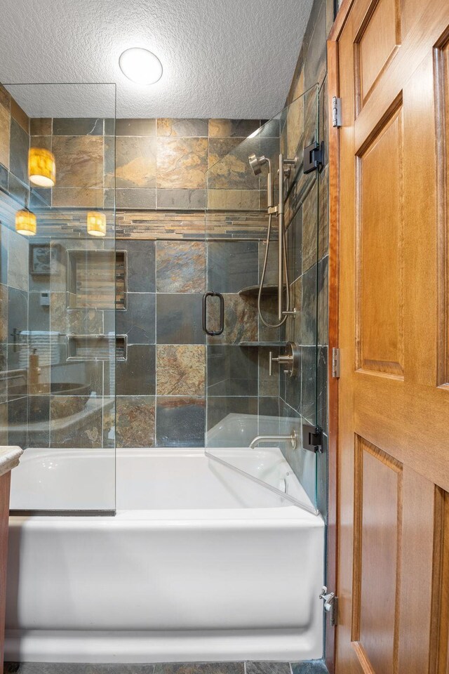 6136 Arctic Way, Edina, MN 55436 - bathroom featuring a textured ceiling and enclosed tub / shower combo