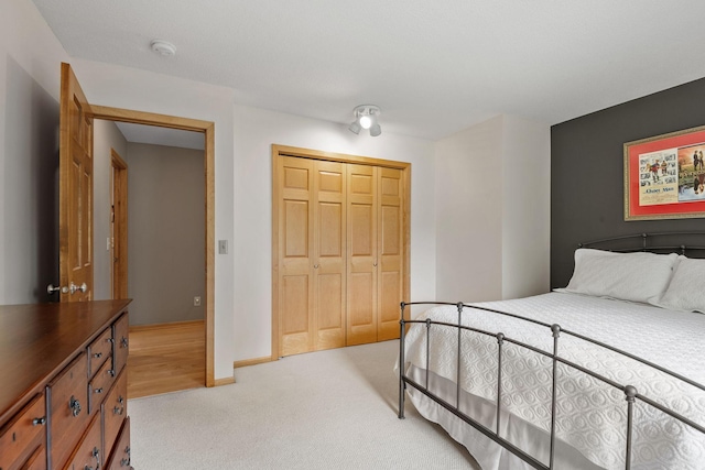 6136 Arctic Way, Edina, MN 55436 - bedroom featuring a closet and light colored carpet