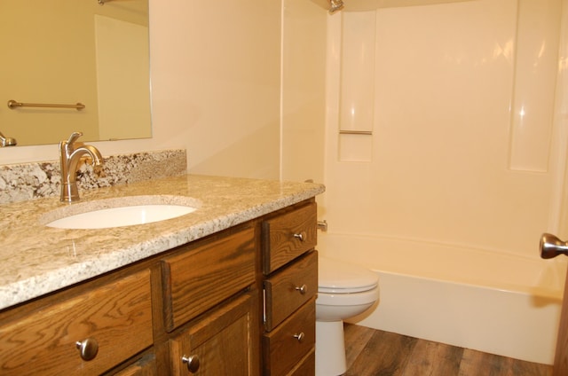 1903 Silver Bell Rd Unit 219, Eagan, MN 55122 - full bath with toilet, vanity, wood finished floors, and shower / washtub combination
