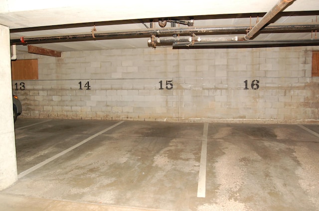 1903 Silver Bell Rd Unit 219, Eagan, MN 55122 - parking deck featuring concrete block wall