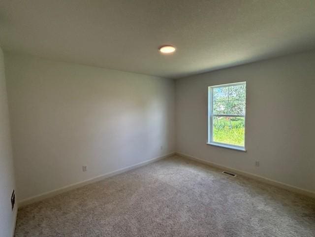 6272 205th St N, Forest Lake, MN 55025 - empty room featuring carpet floors and baseboards