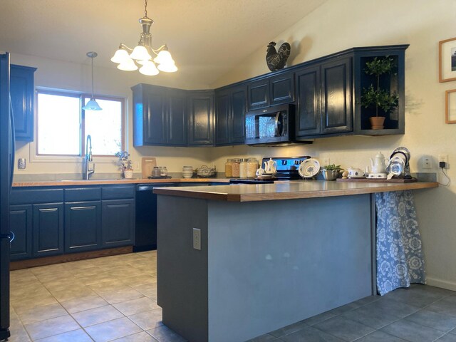 1496 Willard Lake Rd NW, Powers Twp, MN 56435 - kitchen featuring black appliances, a sink, lofted ceiling, a peninsula, and blue cabinetry