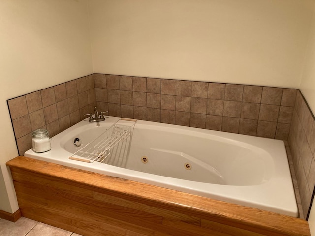 1496 Willard Lake Rd NW, Powers Twp, MN 56435 - bathroom with a tub with jets and tile patterned floors