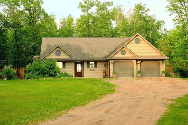 1496 Willard Lake Rd NW, Powers Twp, MN 56435 - view of front of home featuring driveway, a garage, a front yard, and roof with shingles