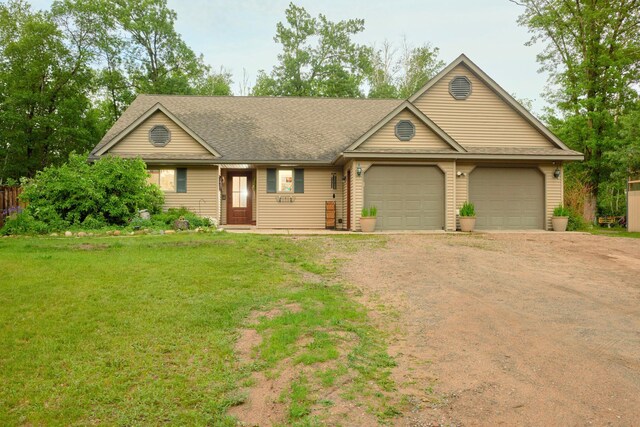 1496 Willard Lake Rd NW, Powers Twp, MN 56435 - single story home with driveway, an attached garage, a front yard, and roof with shingles