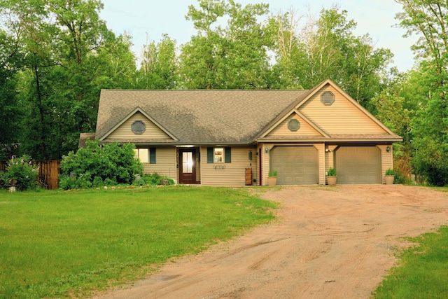 1496 Willard Lake Rd NW, Powers Twp, MN 56435 - view of front of property with driveway, a garage, a front yard, and a shingled roof