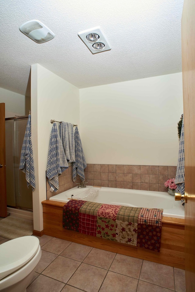 1496 Willard Lake Rd NW, Powers Twp, MN 56435 - full bathroom featuring a bath, tile patterned floors, a stall shower, and a textured ceiling