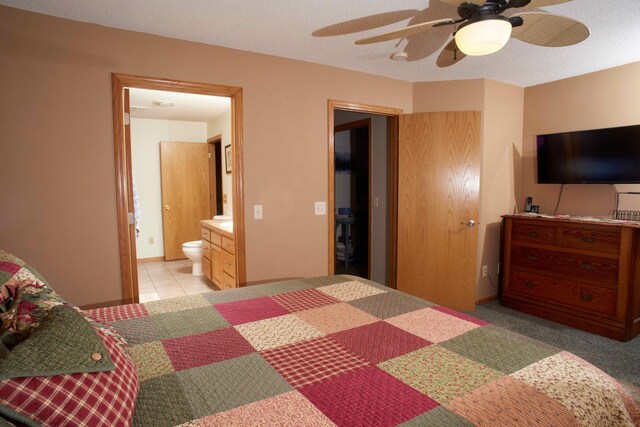 1496 Willard Lake Rd NW, Powers Twp, MN 56435 - bedroom featuring ensuite bathroom and a ceiling fan