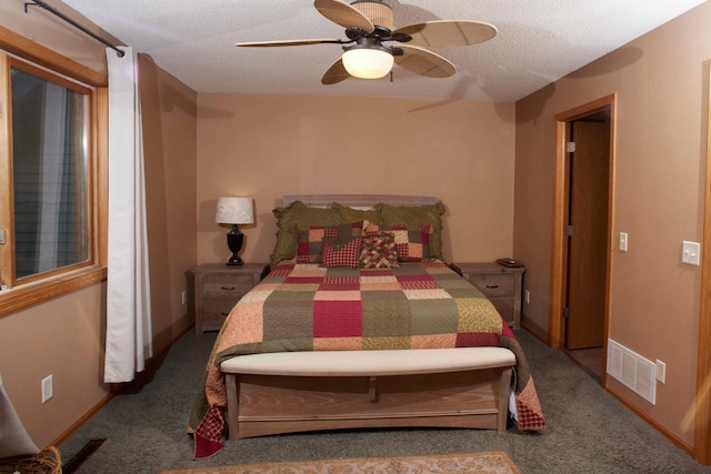 1496 Willard Lake Rd NW, Powers Twp, MN 56435 - bedroom featuring carpet floors, a textured ceiling, and ceiling fan