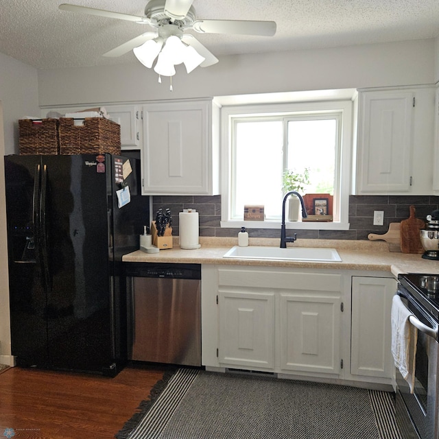 849 11th Ave W, West Fargo, ND 58078 - kitchen featuring stainless steel appliances, a sink, white cabinetry, ceiling fan, and backsplash