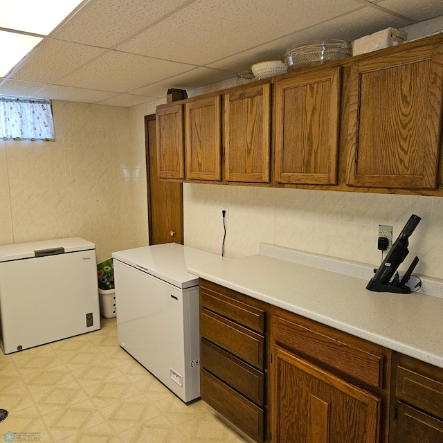 849 11th Ave W, West Fargo, ND 58078 - washroom featuring cabinet space and light flooring