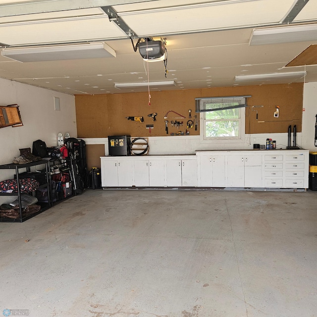 849 11th Ave W, West Fargo, ND 58078 - garage featuring a garage door opener