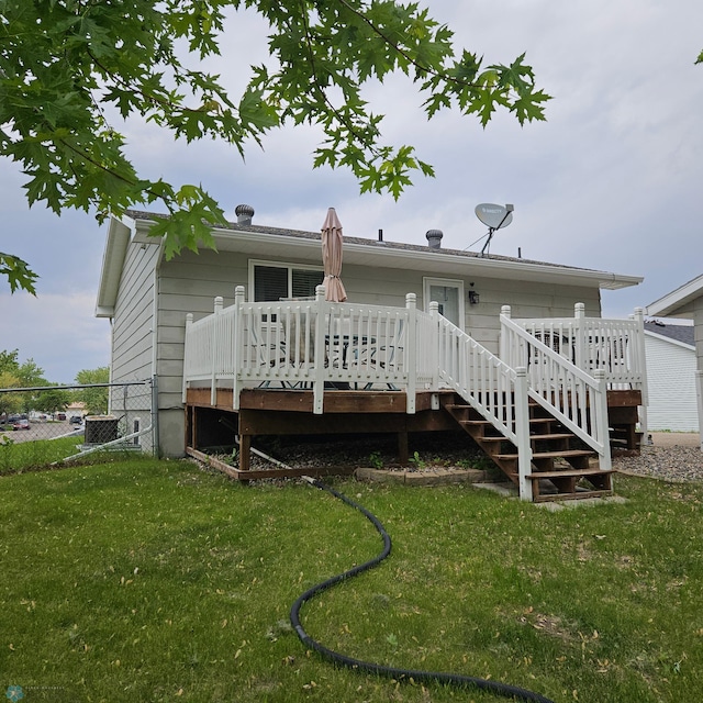 849 11th Ave W, West Fargo, ND 58078 - back of house featuring a deck, stairway, and central air condition unit