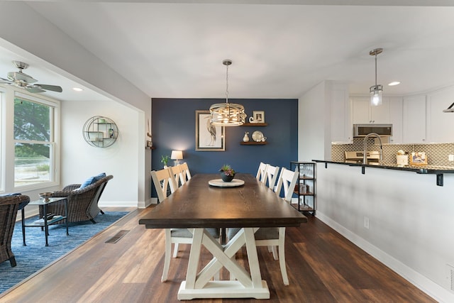 6813 Boudin St NE, Prior Lake, MN 55372 - dining space featuring a chandelier, dark wood-type flooring, ceiling fan, and recessed lighting