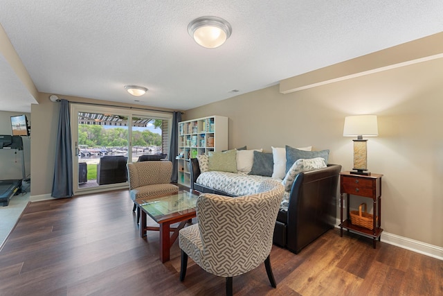 6813 Boudin St NE, Prior Lake, MN 55372 - living area featuring wood finished floors and a textured ceiling