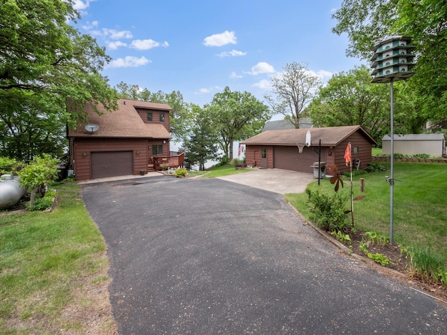 21534 275th Ave, Glenwood Twp, MN 56381 - view of front of home with a front yard and a garage