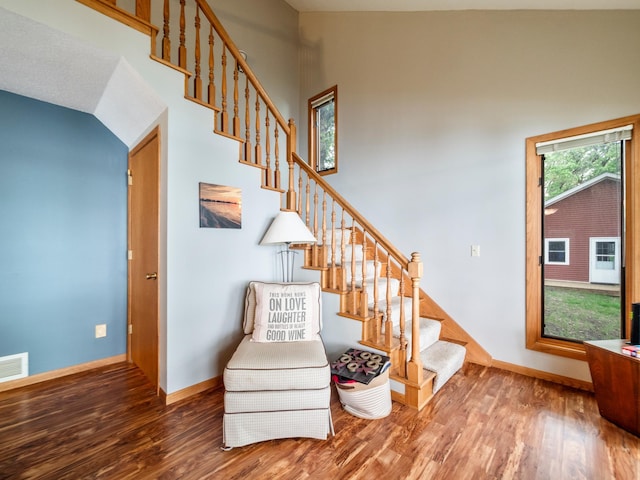 21534 275th Ave, Glenwood Twp, MN 56381 - stairway featuring wood finished floors and baseboards