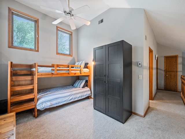 21534 275th Ave, Glenwood Twp, MN 56381 - bedroom with vaulted ceiling, baseboards, ceiling fan, and carpet floors