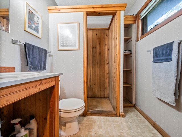 21534 275th Ave, Glenwood Twp, MN 56381 - bathroom with vanity, toilet, and tile patterned floors