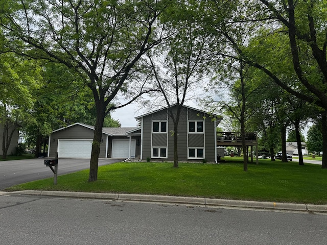 802 Estates Ave, Litchfield, MN 55355 - view of front of property with a front yard and a wooden deck