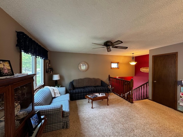 802 Estates Ave, Litchfield, MN 55355 - carpeted living area featuring a textured ceiling and ceiling fan