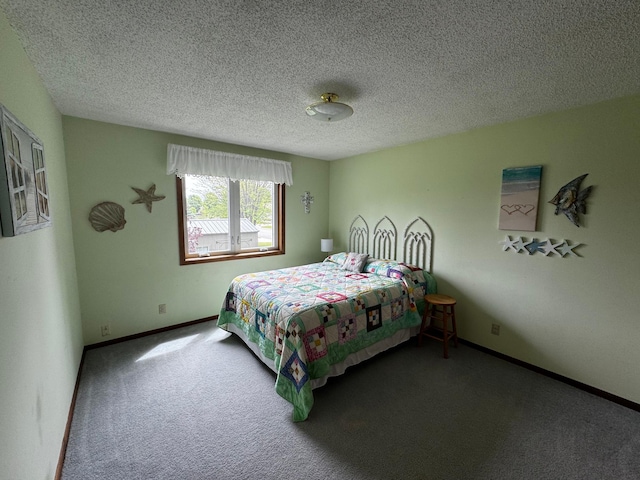 802 Estates Ave, Litchfield, MN 55355 - carpeted bedroom featuring a textured ceiling and baseboards