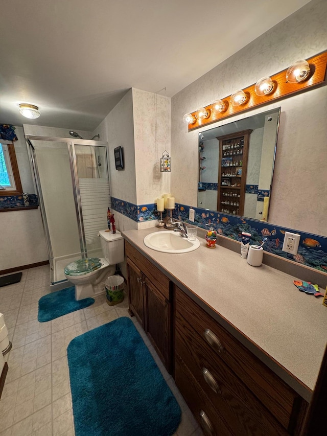 802 Estates Ave, Litchfield, MN 55355 - bathroom with vanity, a stall shower, toilet, and tile patterned flooring