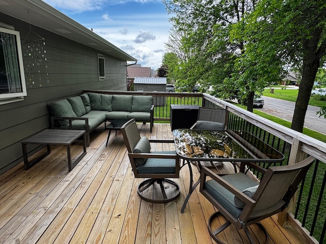 802 Estates Ave, Litchfield, MN 55355 - deck with an outdoor hangout area and outdoor dining space